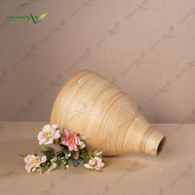 Expertly handcrafted from natural bamboo, this handcrafted bamboo flower vase showcases timeless artisan craftsmanship and sophisticated texture.