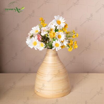 Expertly handmade from natural bamboo, this modern handcrafted bamboo vase showcases refined texture, artisan craftsmanship, and timeless modern design.