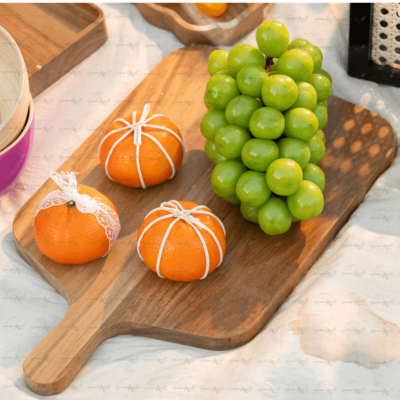 The Wooden Serving Tray adds a warm organic touch to refined hospitality spaces.